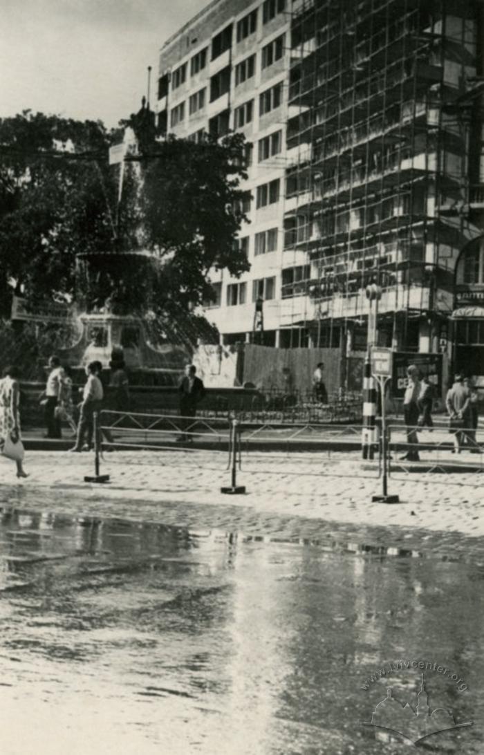 View of 1 Travnia street and the apartment building №6-8 2