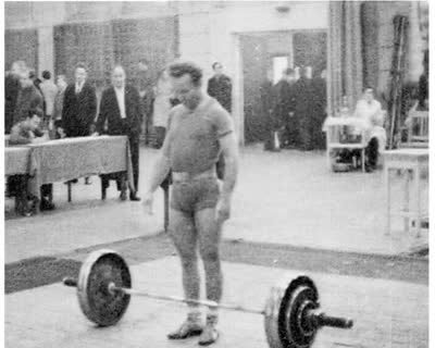 Strong Men on the Weightlifting Platform