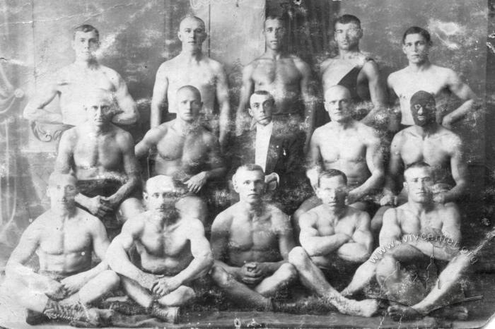 Group of wrestlers after performances in the sports hall of Polish "Sokil-Matir" 2