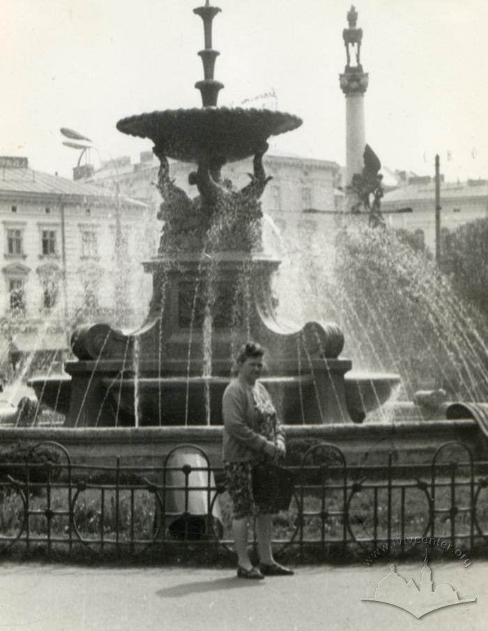 Near a fountain on Mitskevycha square 2