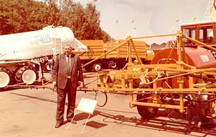 "Lvivkhinsilhospmash" factory director Roman Zaverbnyi near product samples in courtyard 2