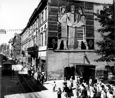 View of Doroshenka Street, and decorative mural on the corner of a building