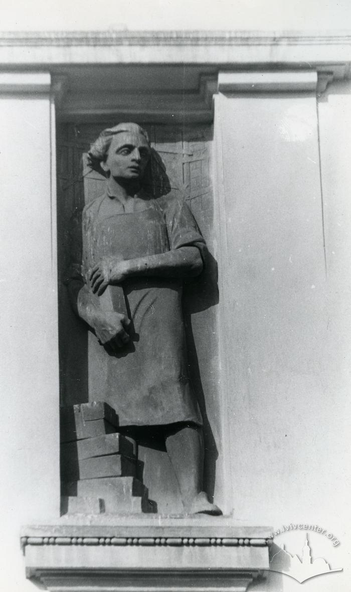 Sculpture of a man at 1 Halytskoho Sq.  2
