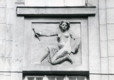Bas-relief of a women at 60 Chuprynky St. 