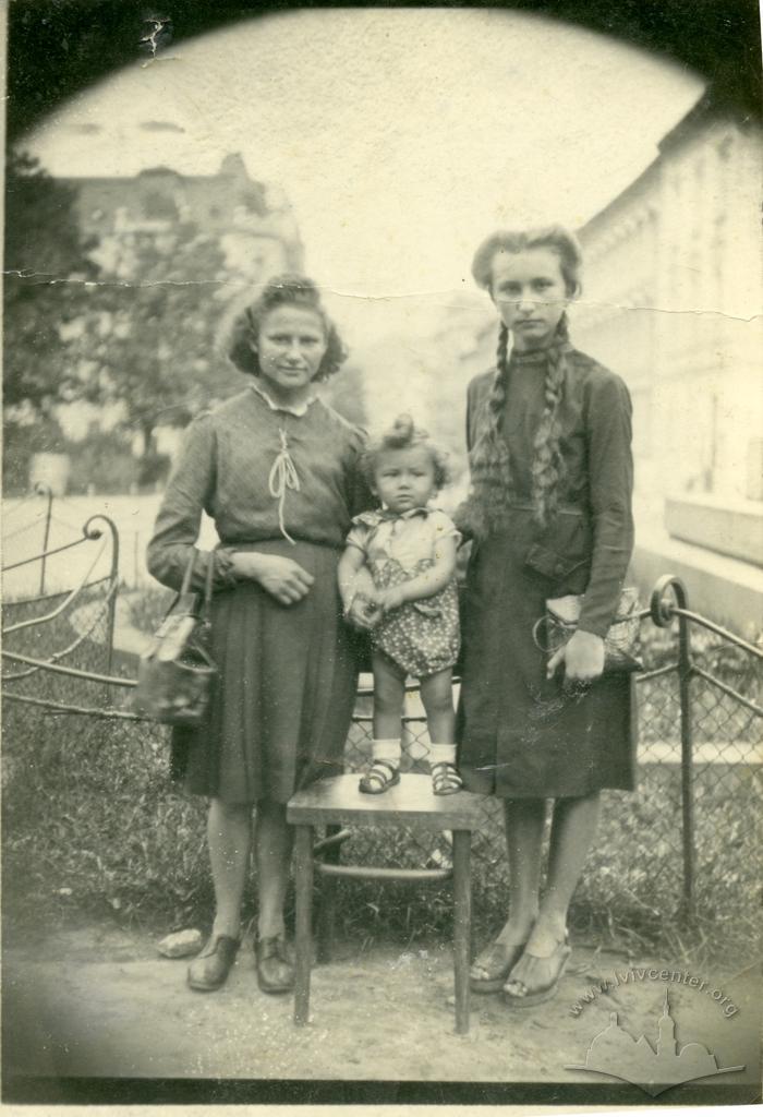 Portrait of two women with a child 2