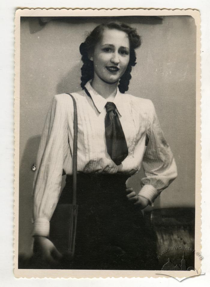 Young woman in a blouse with a tie 2