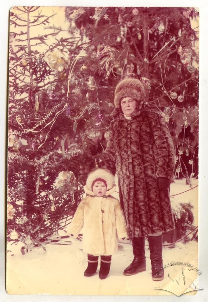 Woman and a child in winter clothes 2