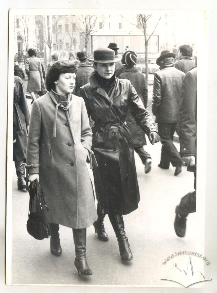 Two women on a street 2