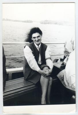 Young woman on a river boat