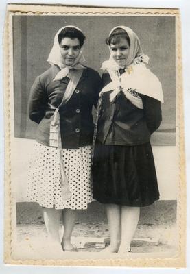 Two young women wearing a headscarves