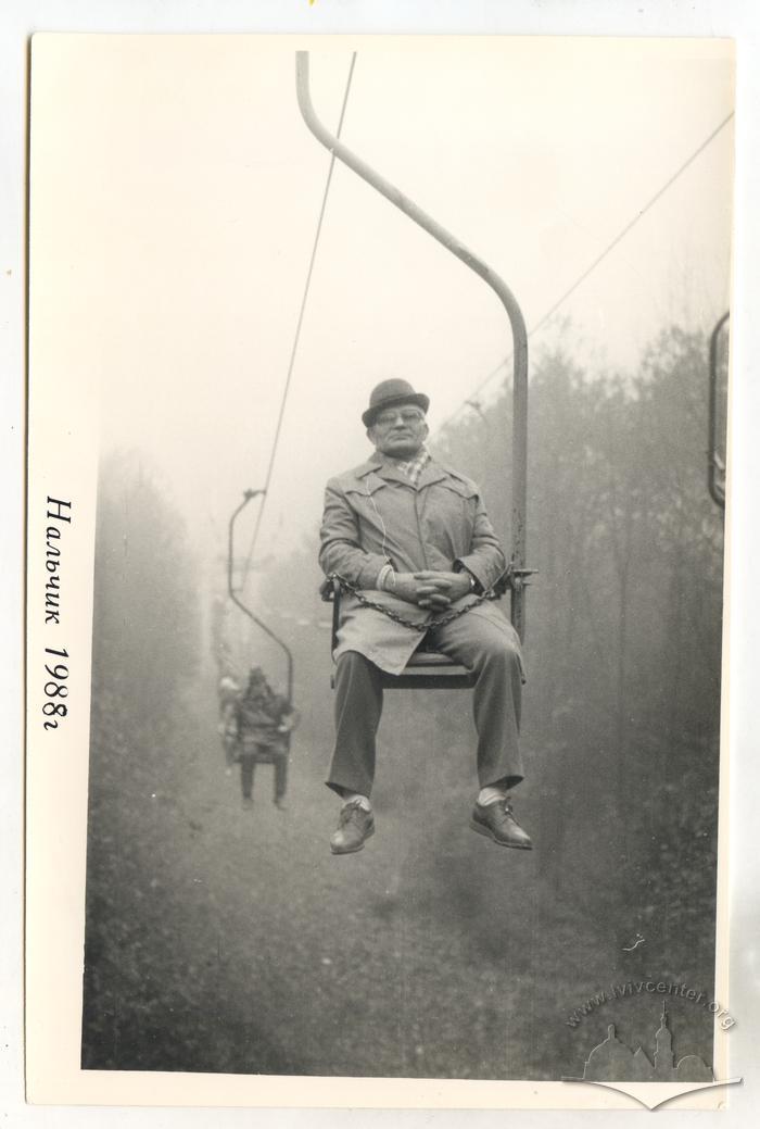 Man on a chairlift 2