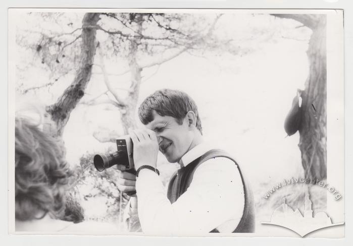 Portrait of a man with a movie camera 2