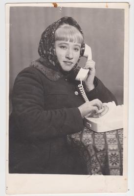 With a telephone receiver