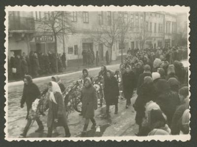 With mourning wreaths